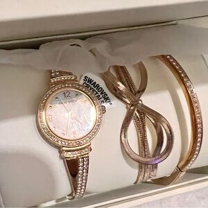 Rose gold watch and bracelets set
